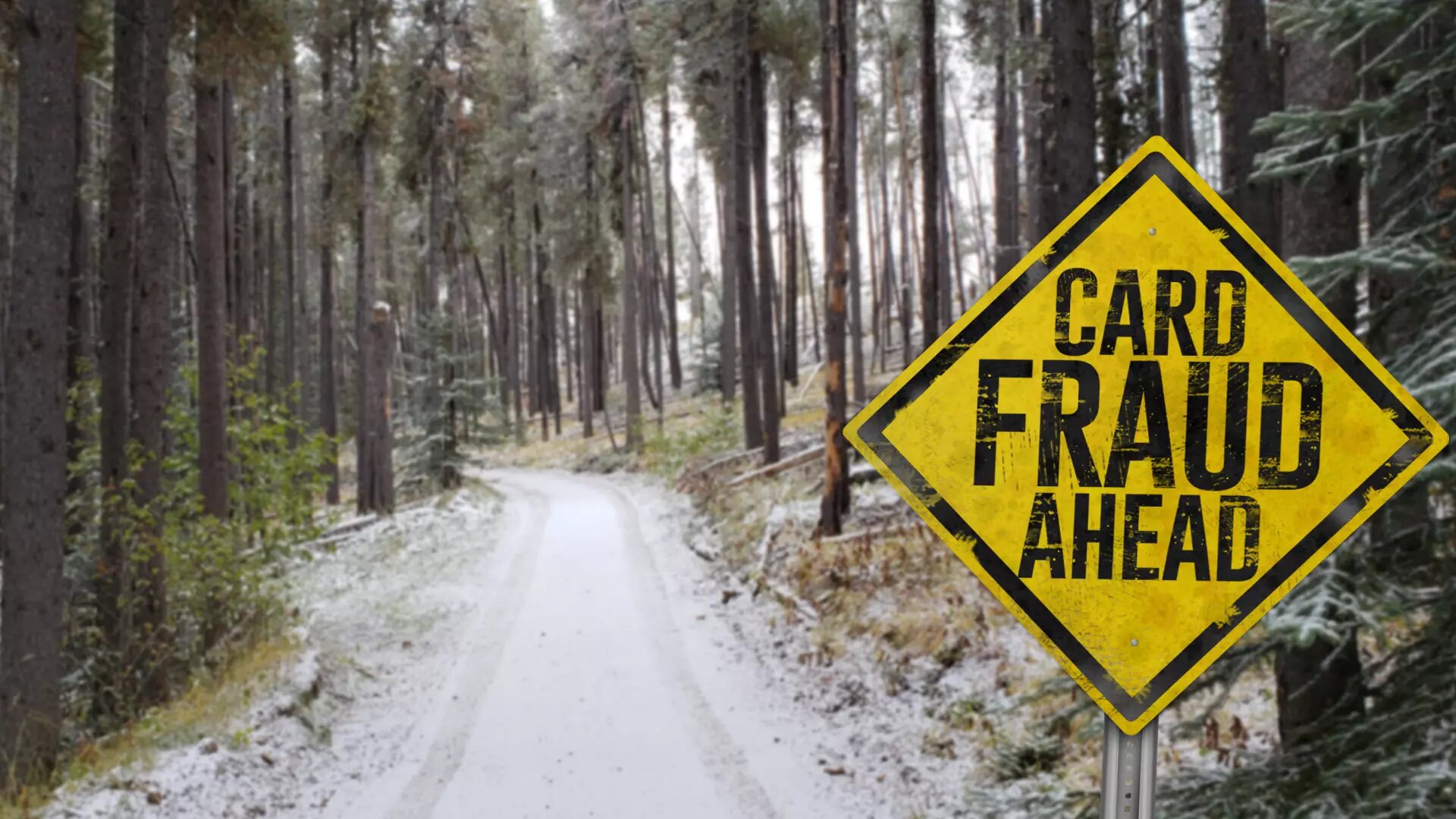 unpaved road with a card fraud ahead side on the right side