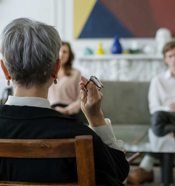 A veterinarian taking care of a cat