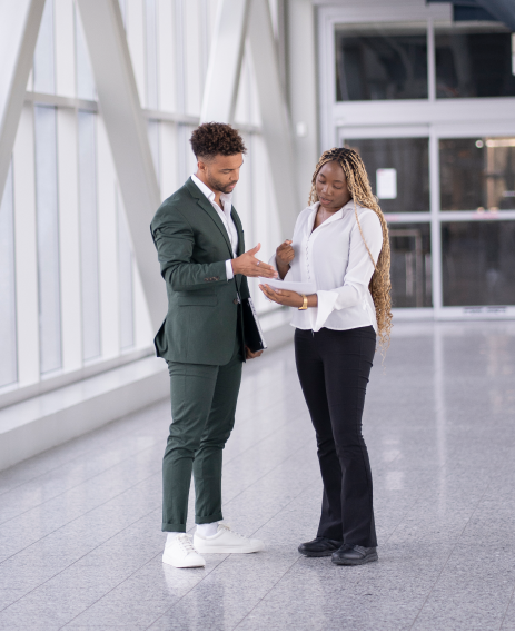 Two people are discussing something