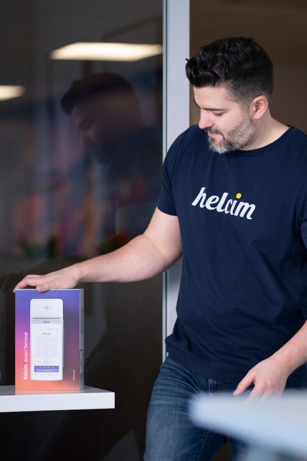 CEO Nic Beique standing next to the Helcim Smart Terminal
