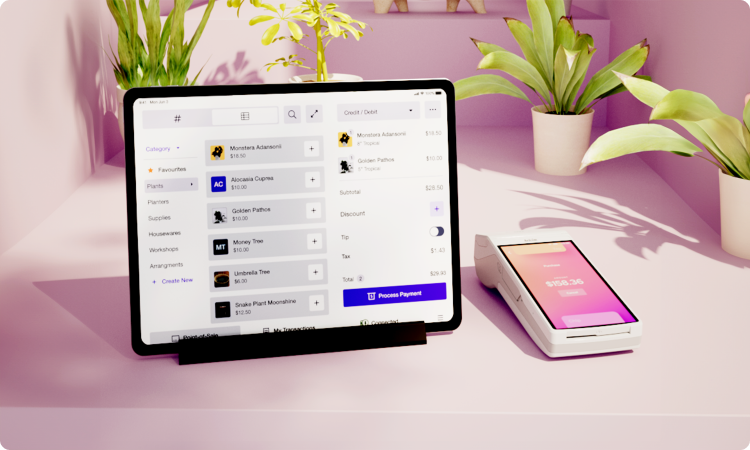 Helcim pos system and the Helcim card reader on a stand with card inserted