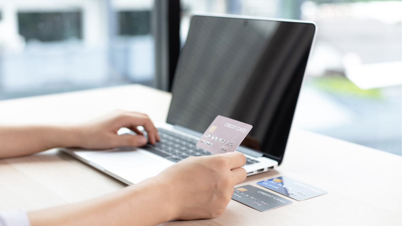 A person paying online with a credit card