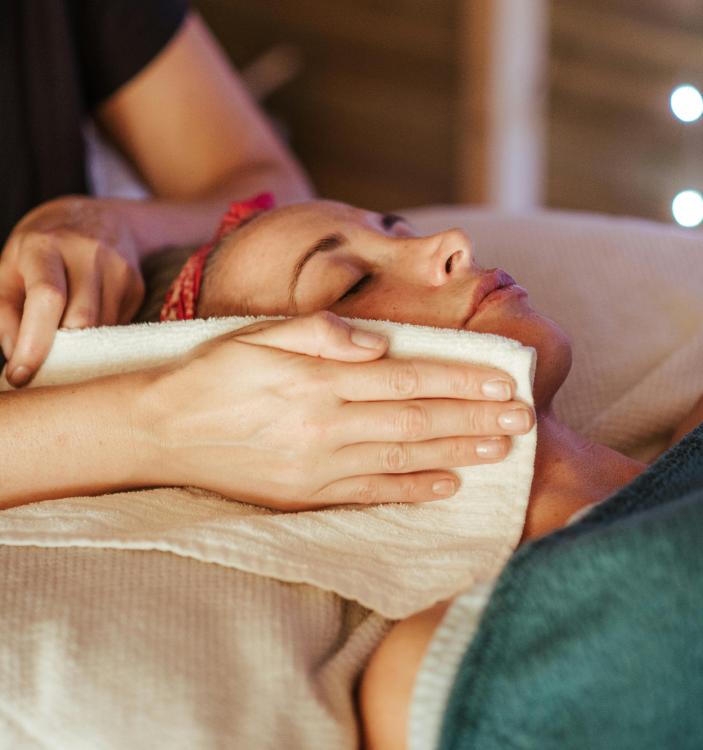 A veterinarian taking care of a cat